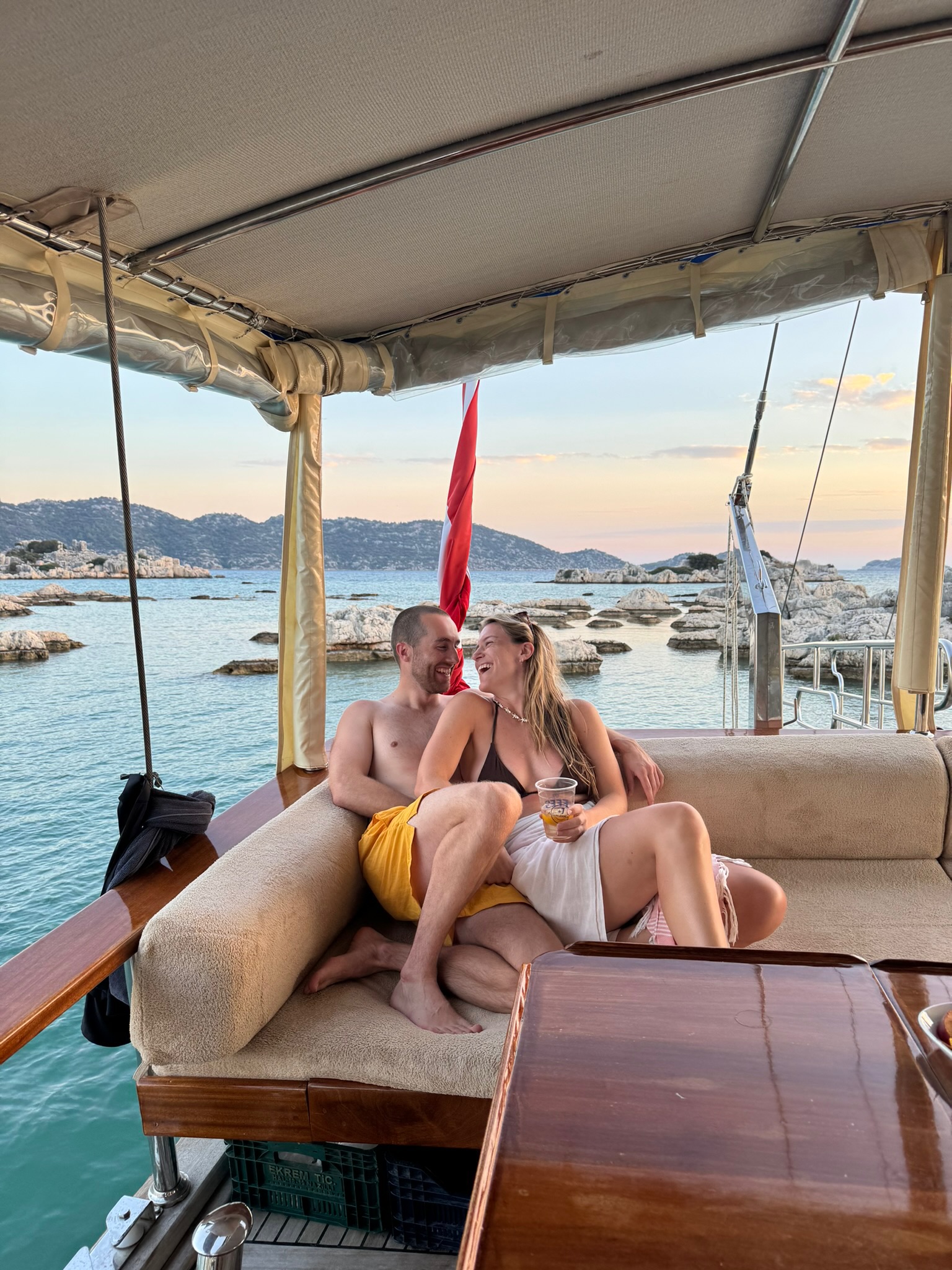 Watching the sunset together from a boat